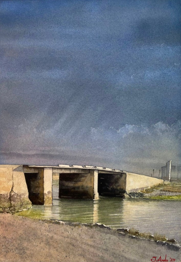Watercolor painting of Puente Lavaera in San Fernando, showing reflections on wet marshes after a storm under a heavy sky